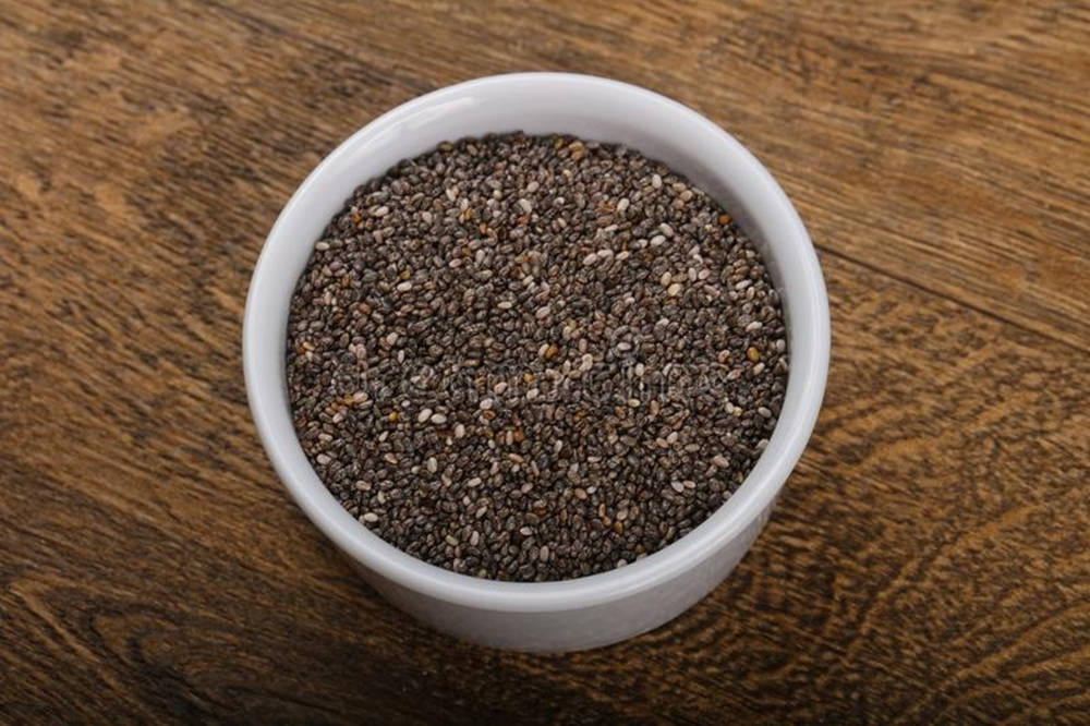 Invigorating Raw Chia Seeds In A Ramekin Bowl Wallpaper