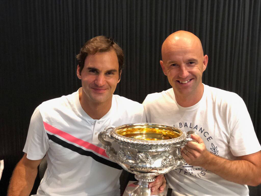 Ivan Ljubicic Coaching Roger Federer During A Tennis Match Wallpaper