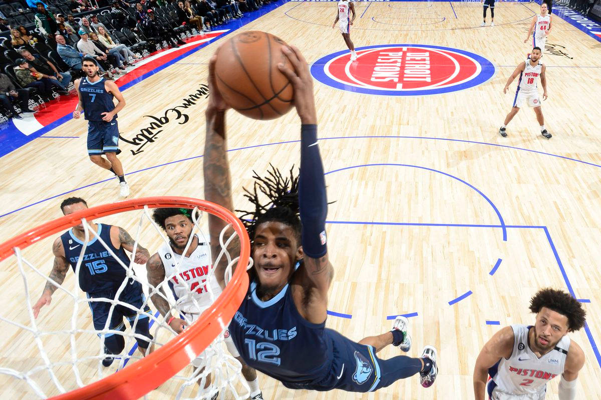 Ja Morant Dunk In Pistons Arena Wallpaper