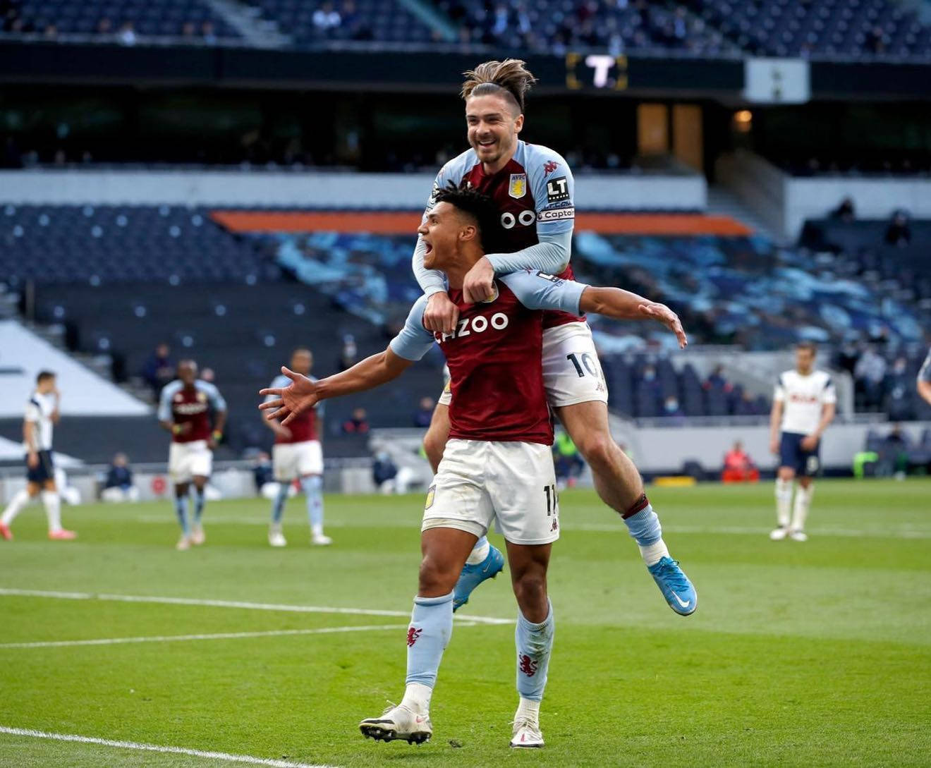 Jack Grealish Jumping On Ollie Watkins Wallpaper