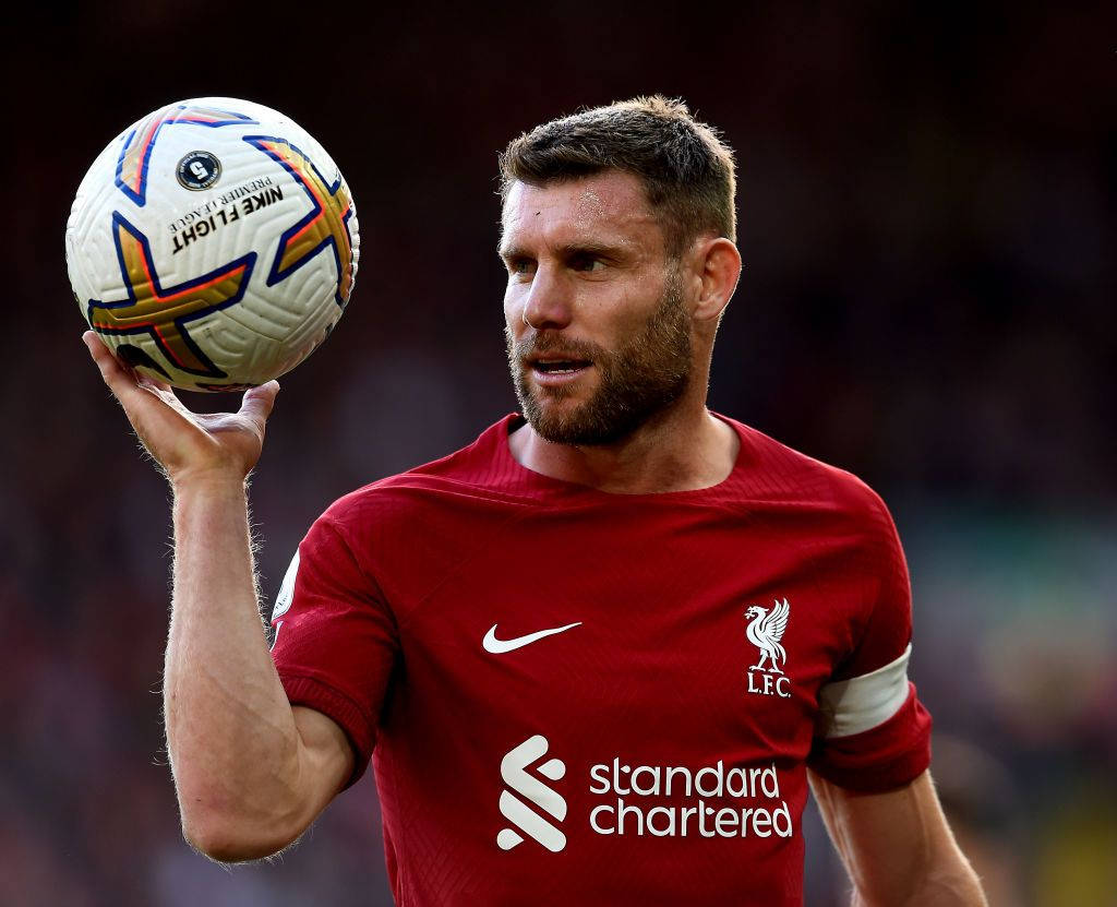 James Milner Holding Ball Up Wallpaper