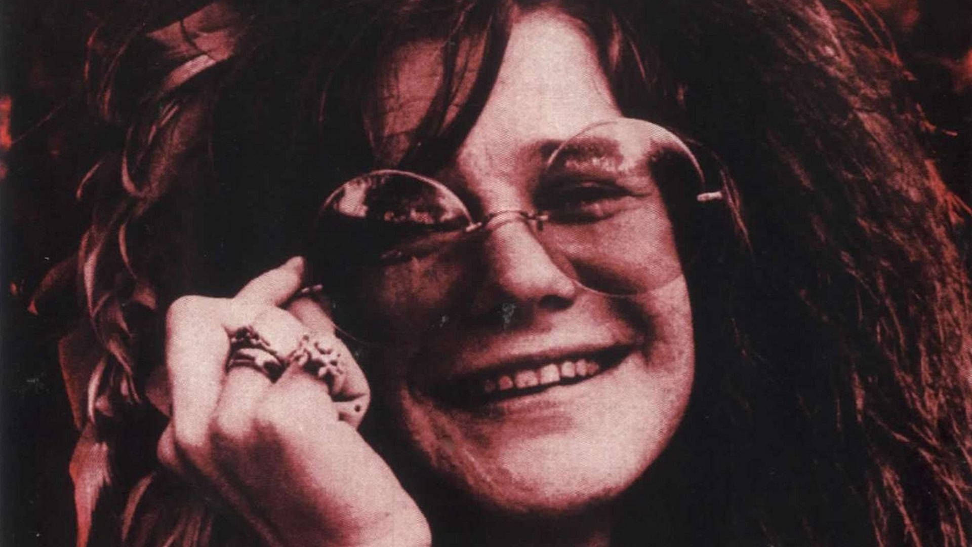 Janis Joplin's Vintage Verve - The Essence Of Psychedelic Era Music Wallpaper