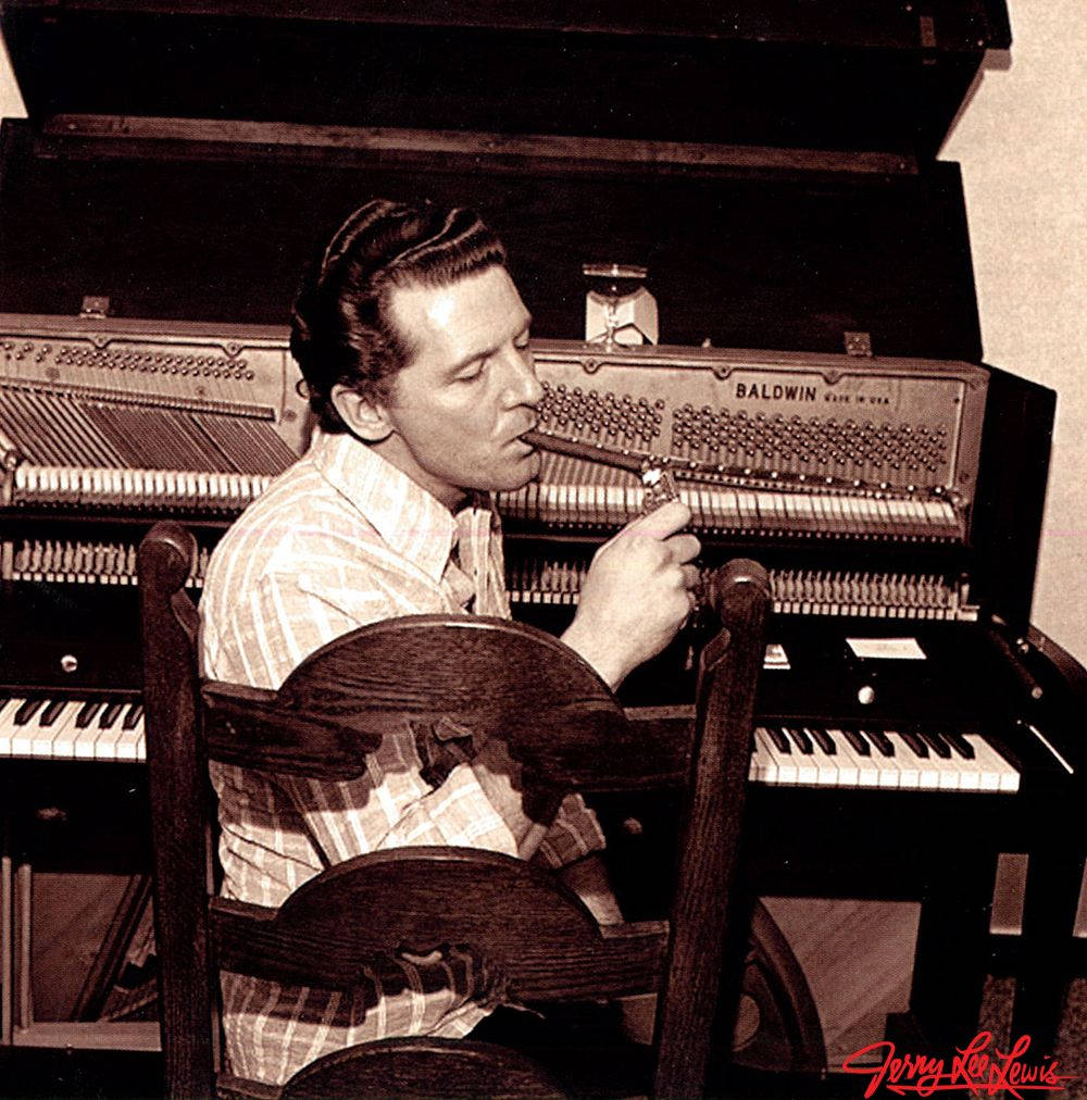 Jerry Lee Lewis Lighting Up Cigar Wallpaper