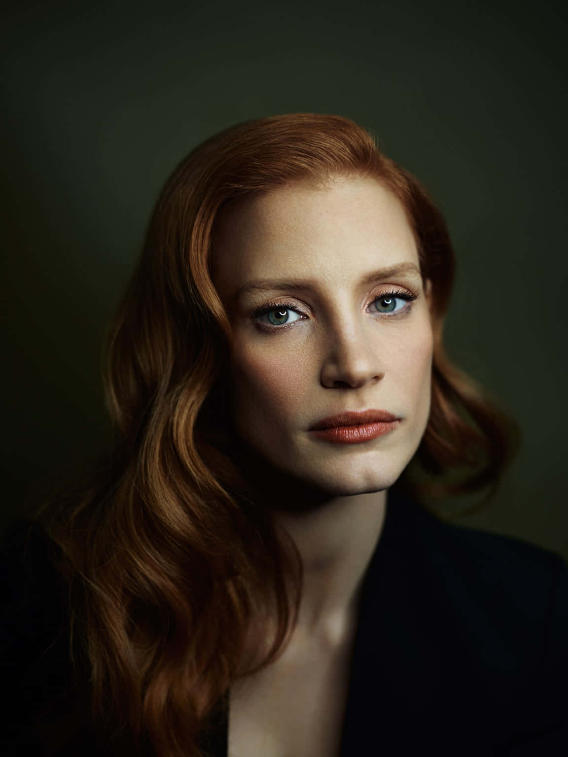 Jessica Chastain Posing In An Elegant Photoshoot Wallpaper