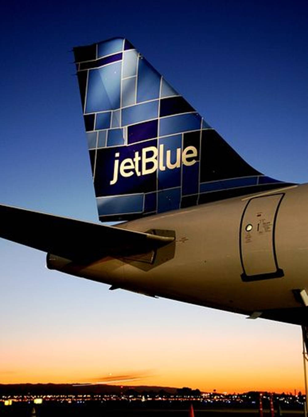 Jetblue Airways Airlines Logo On Plane Rudders Wallpaper