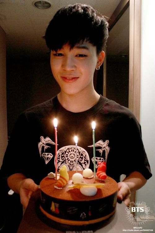 Jimin Of Bts Holds A Giant Cake Wallpaper