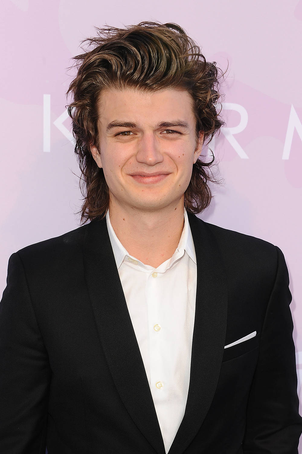 Joe Keery In Black Blazer Wallpaper