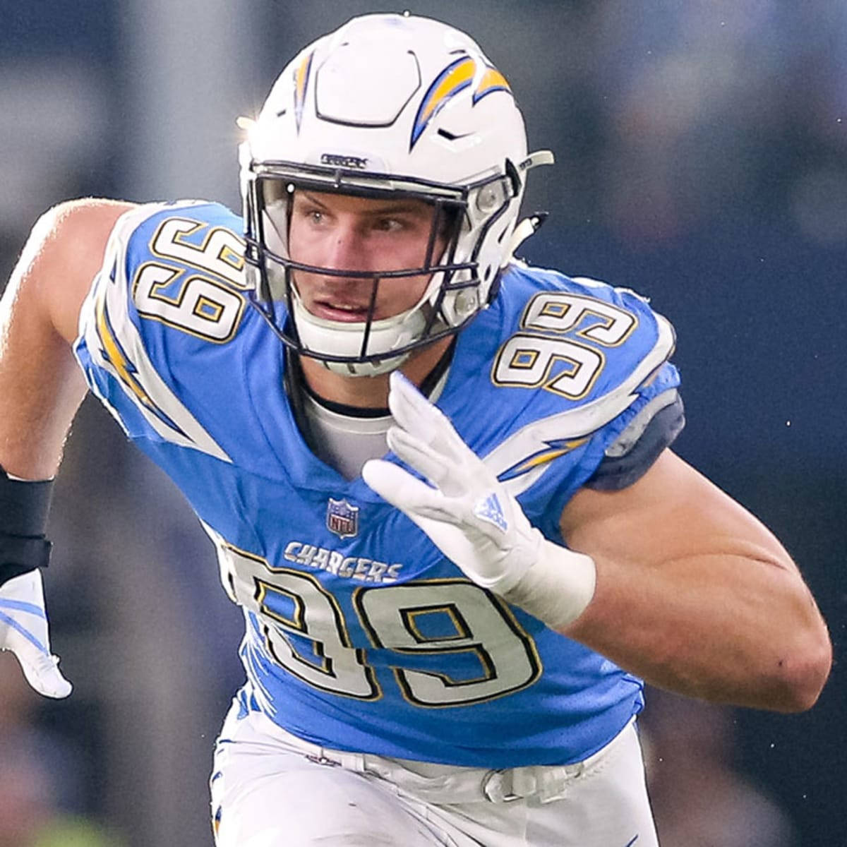 Joey Bosa Football Player Running Speed Wallpaper