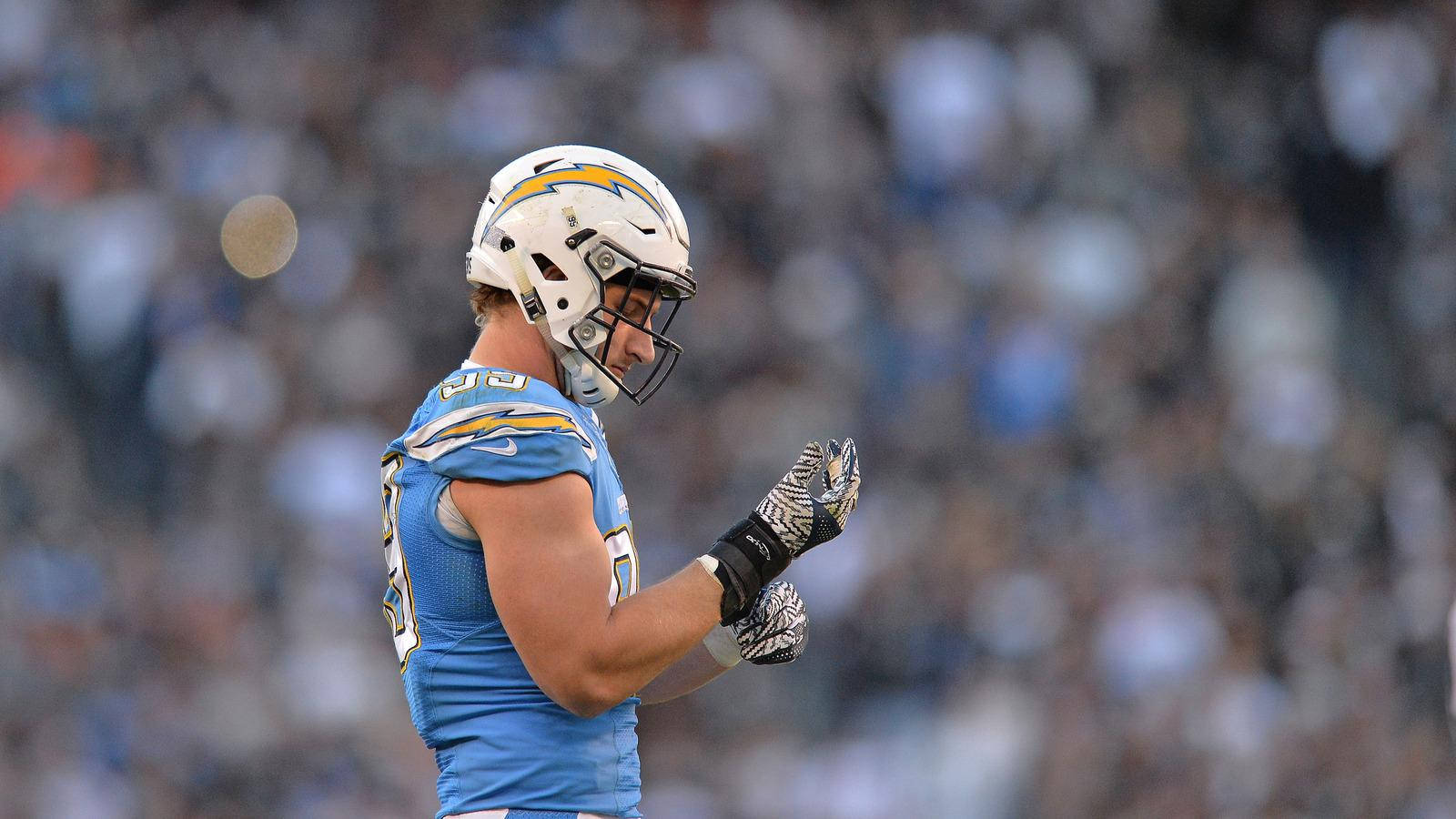 Joey Bosa Touching Nfl Moment Wallpaper