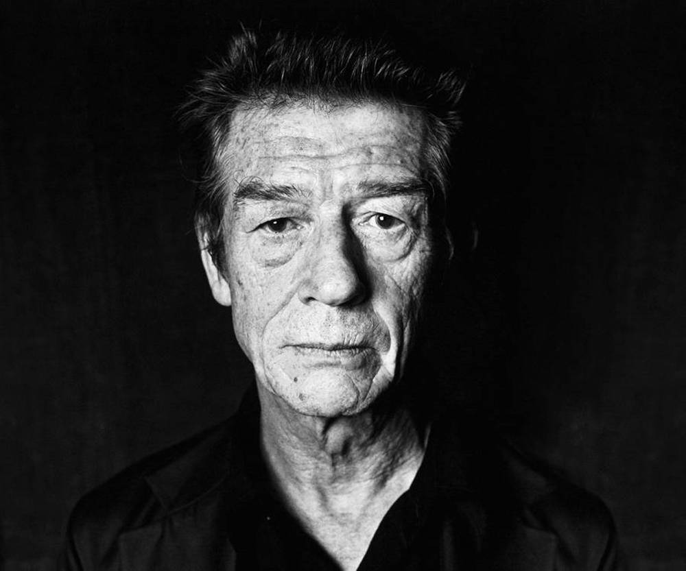 John Hurt Black And White On Black Background Wallpaper