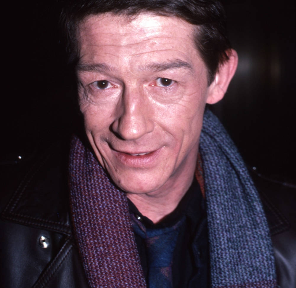 John Hurt Wearing Scarf Wallpaper