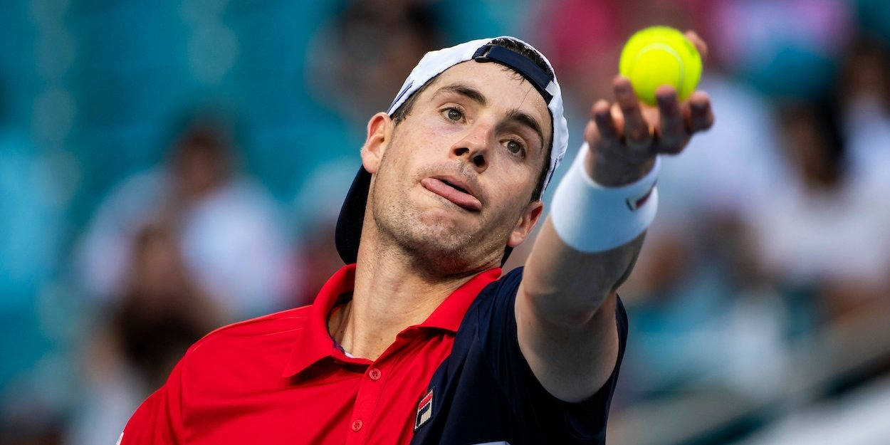 John Isner Holding A Tennis Ball Wallpaper