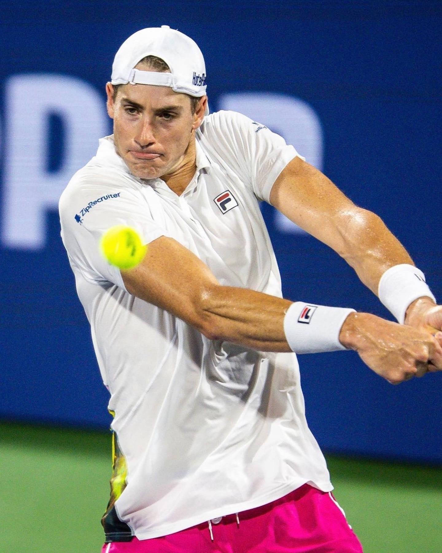 John Isner In Action - Striving For Excellence In Tennis Wallpaper