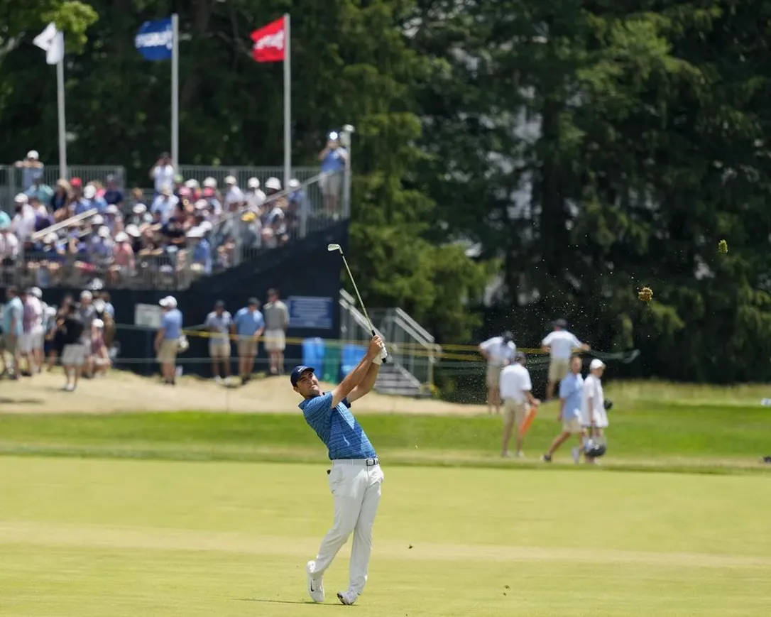 Jon Rahm With His Golf Club Wallpaper