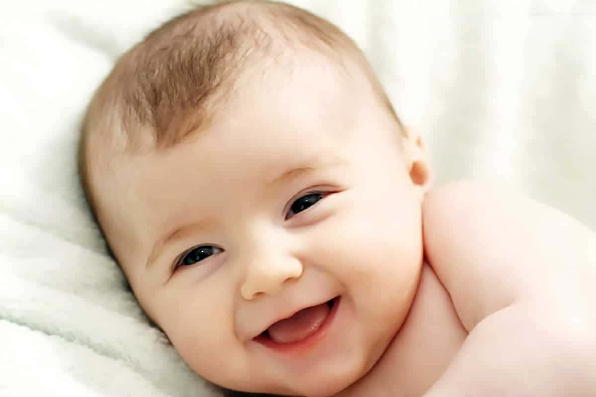 Joyful Infant Smiling Wallpaper