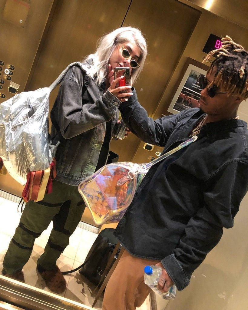 Juice Wrld And Ally In An Elevator Wallpaper