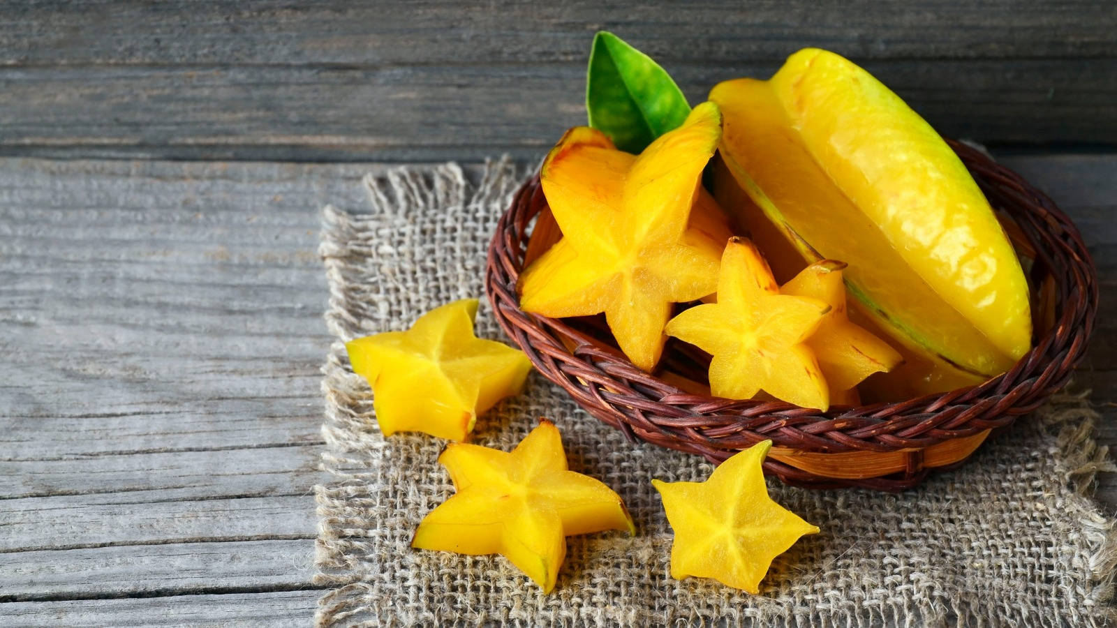 Juicy Carambola In A Rattan Basket Wallpaper