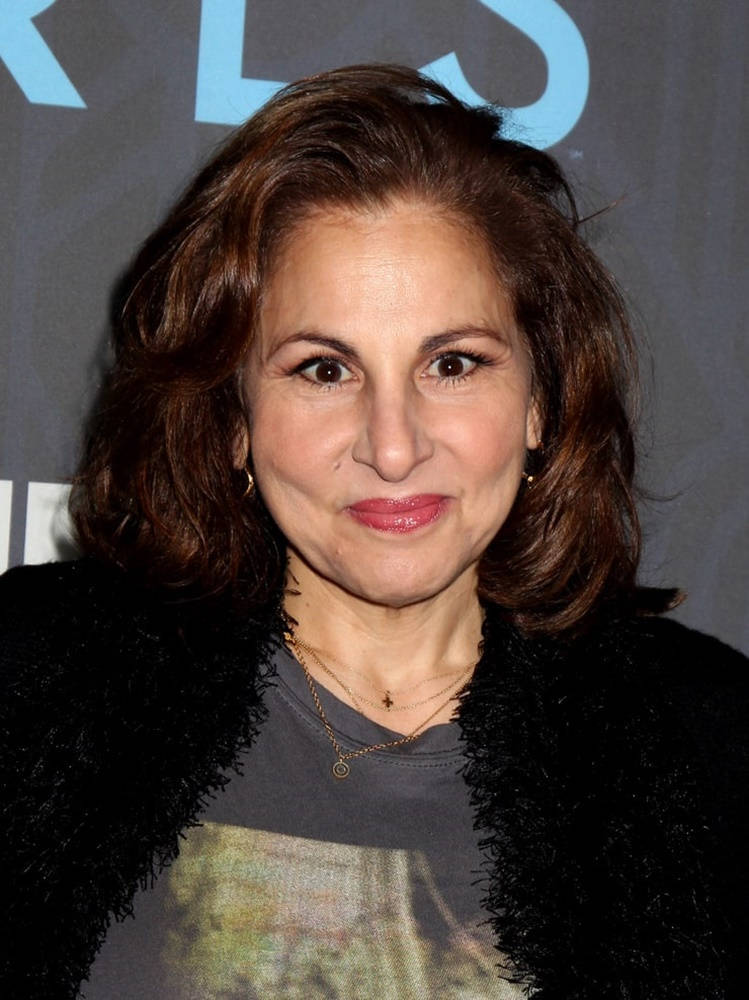 Kathy Najimy Glamorously Dressed In A Black Fur Jacket Wallpaper