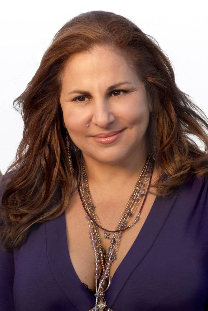 Kathy Najimy In A Dark Purple Top Wallpaper