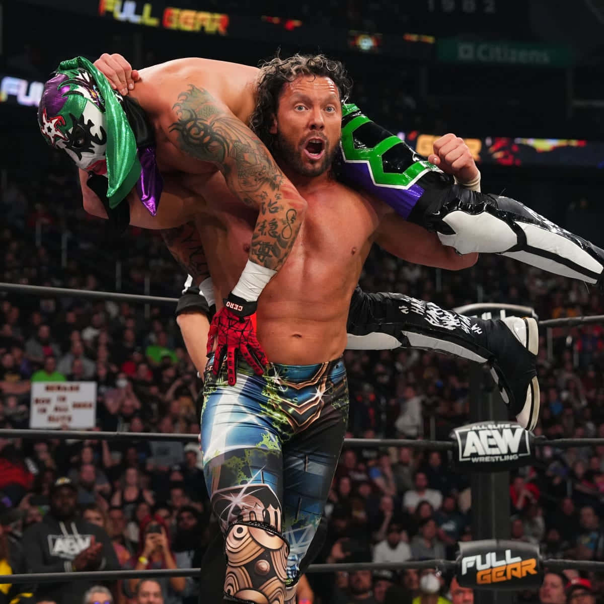 Kenny Omega Carrying Pentagón Jr Wallpaper