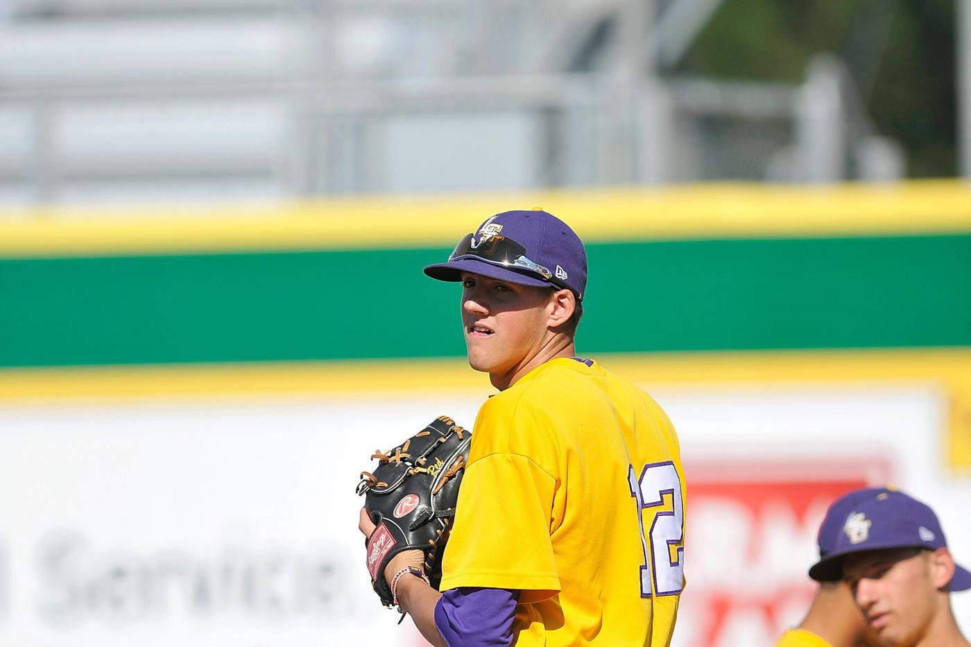 Kevin Gausman In College Yellow Jersey Wallpaper