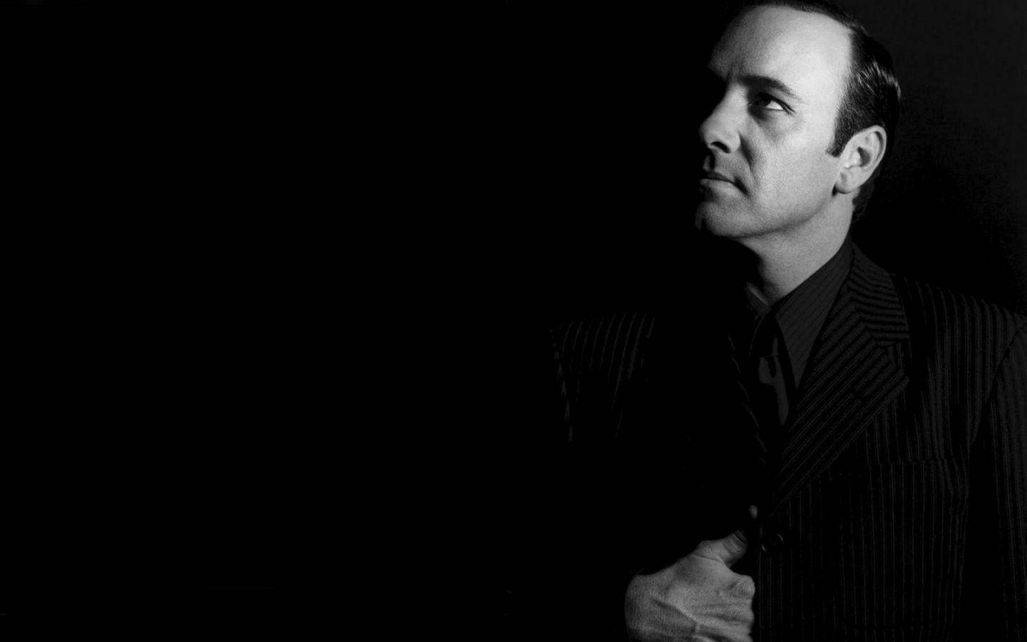 Kevin Spacey In A Dark Background Wallpaper