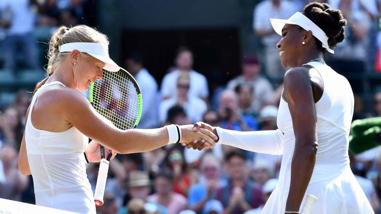 Kiki Bertens Celebrating Her Victory With A Handshake Wallpaper