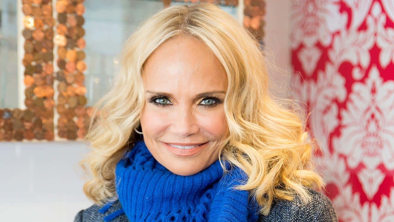 Kristin Chenoweth Striking A Pose In A Stunning Red Dress Wallpaper