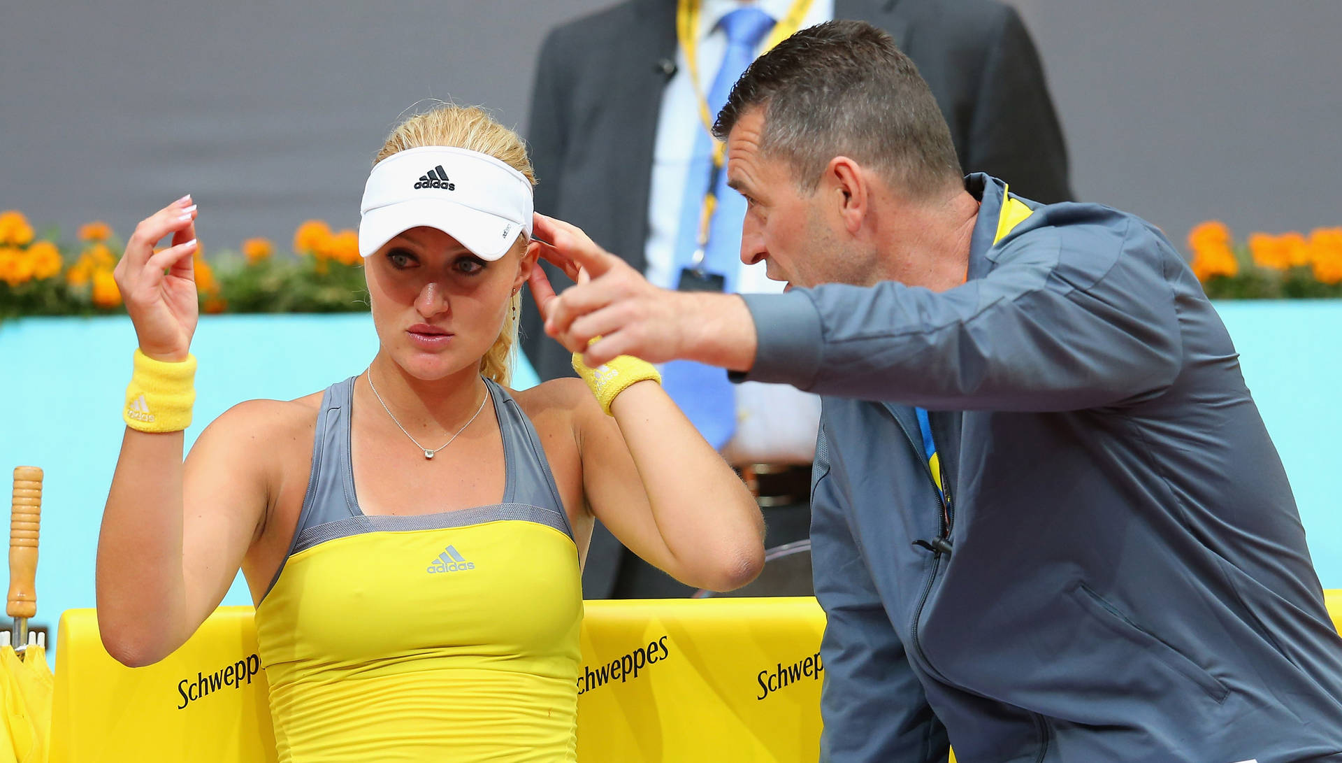 Kristina Mladenovic Talking To Her Coach Wallpaper