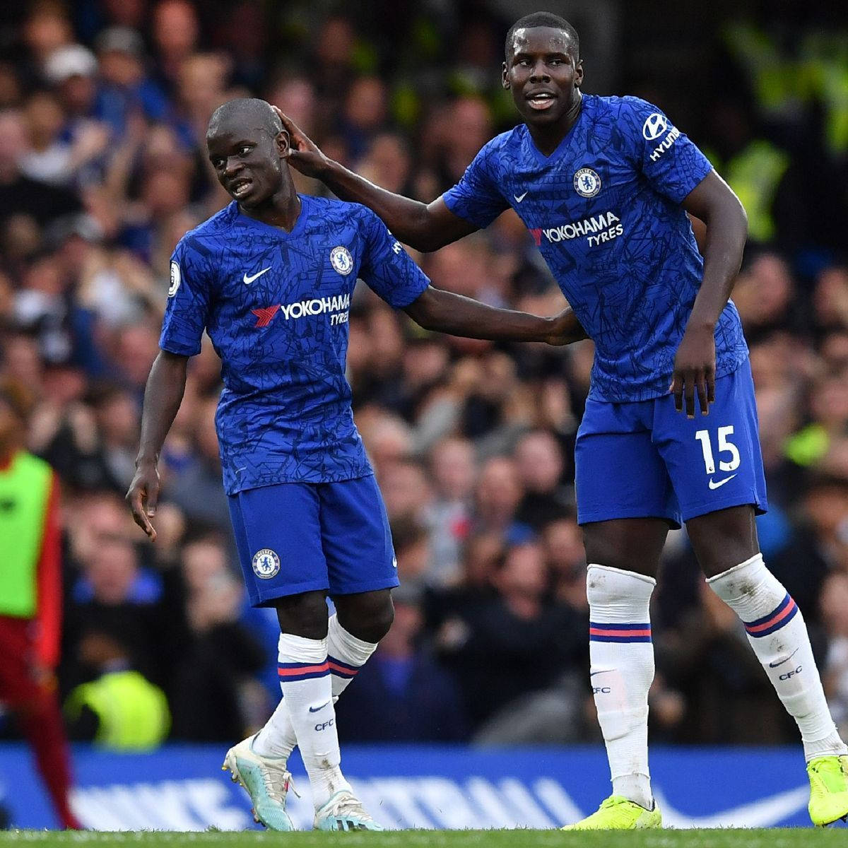 Kurt Zouma Touching Head Teammate Wallpaper