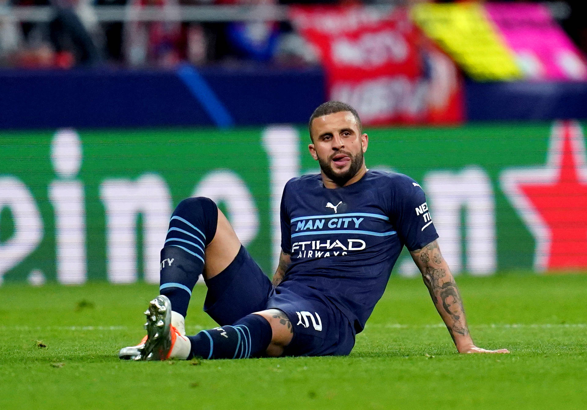 Kyle Walker Sitting On The Field Wallpaper