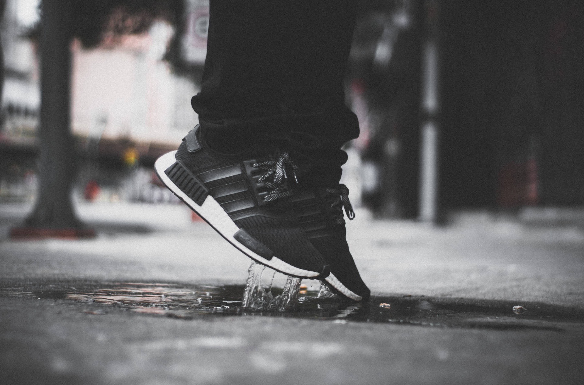 Leap Forward With Adidas Black Shoes Wallpaper
