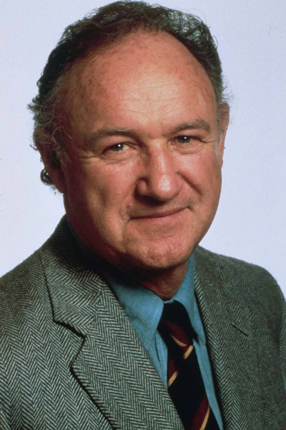 Legendary Actor Gene Hackman Posing For A Portrait Wallpaper