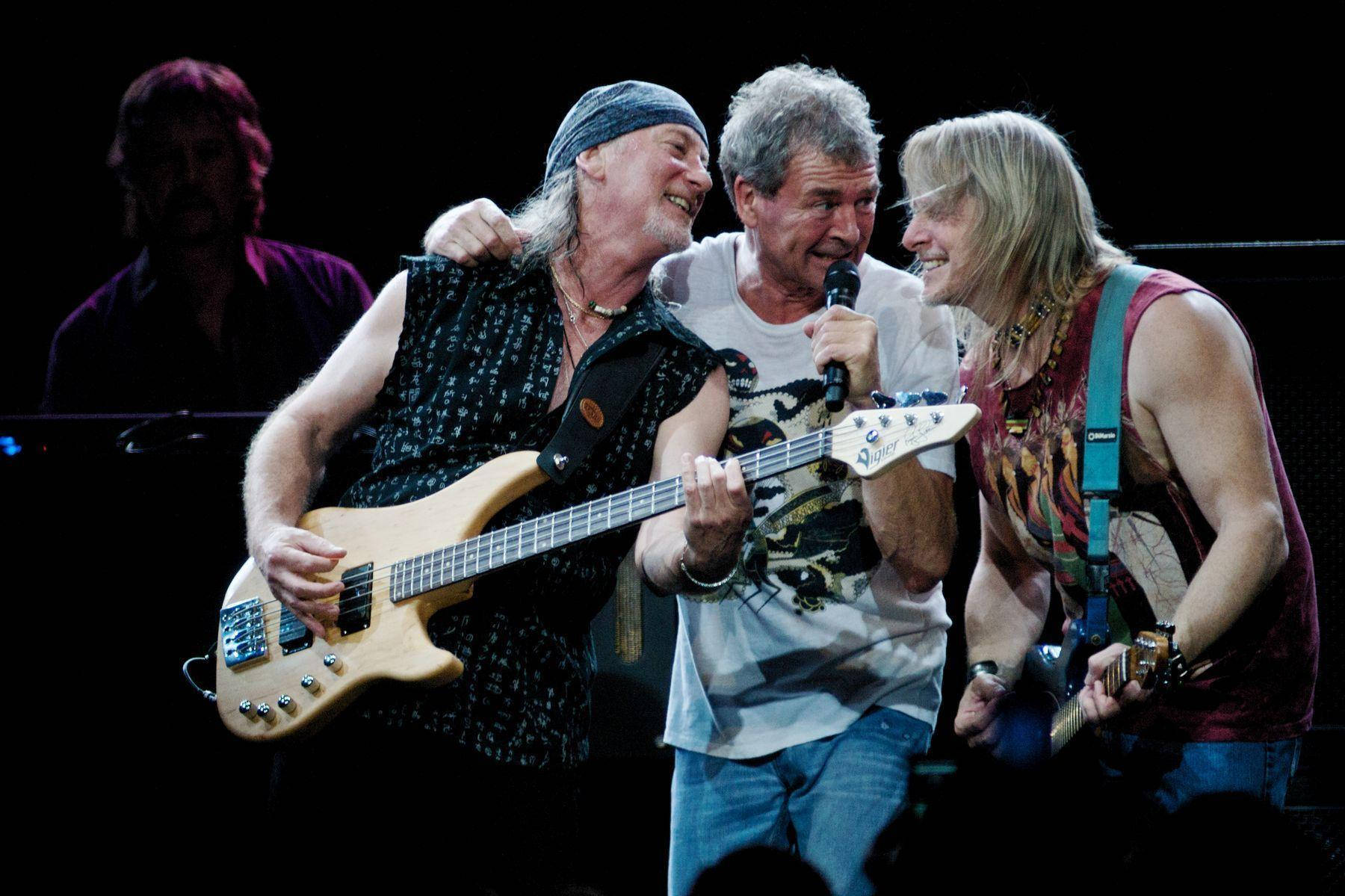 Legendary British Rock Band Deep Purple Performing Live During Their Rapture Of The Deep Tour. Wallpaper