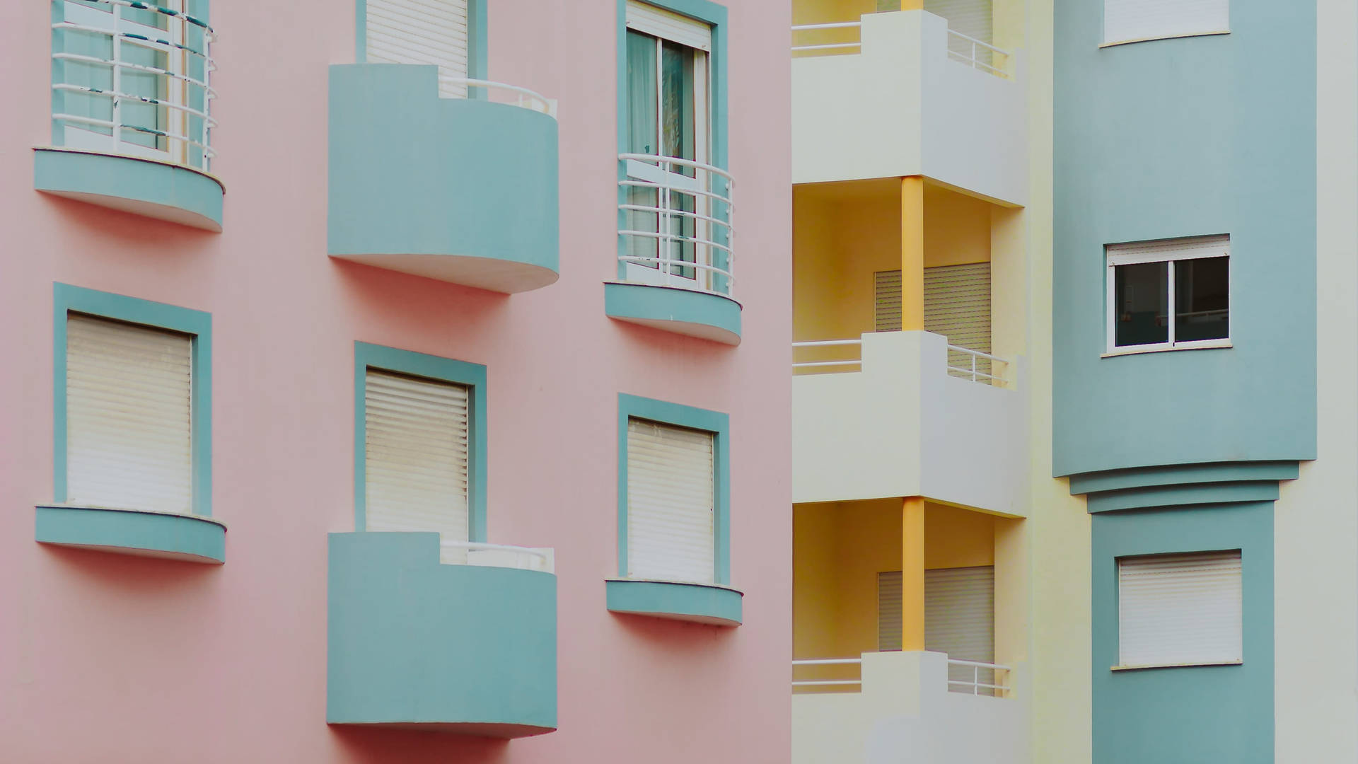 Light Blue And Pink Building Wallpaper