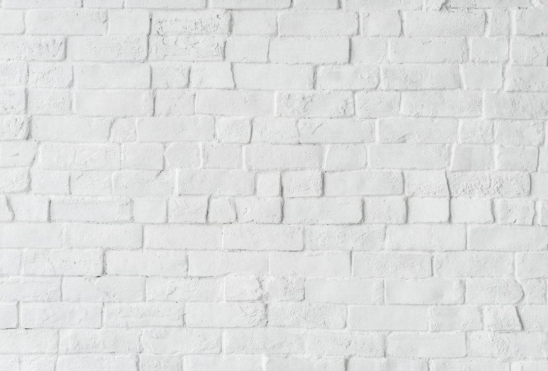 Lopsided White Brick Wallpaper