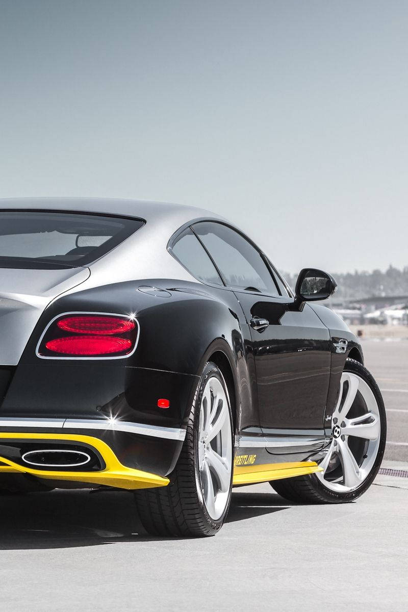 Luxurious Bentley Car In Black & Yellow Wallpaper