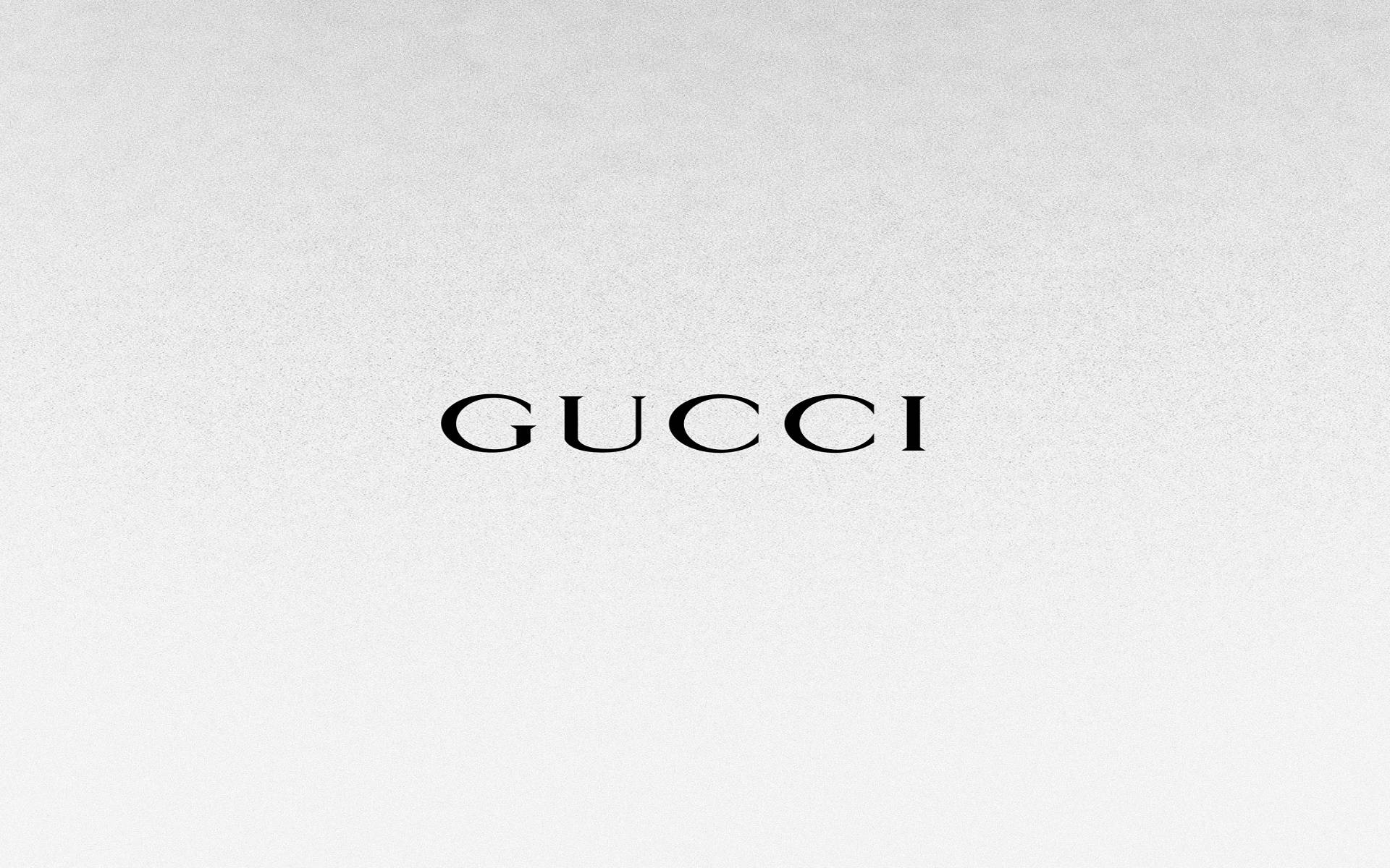 Luxury Defined - Exquisite Gucci Emblem In 4k Resolution Wallpaper