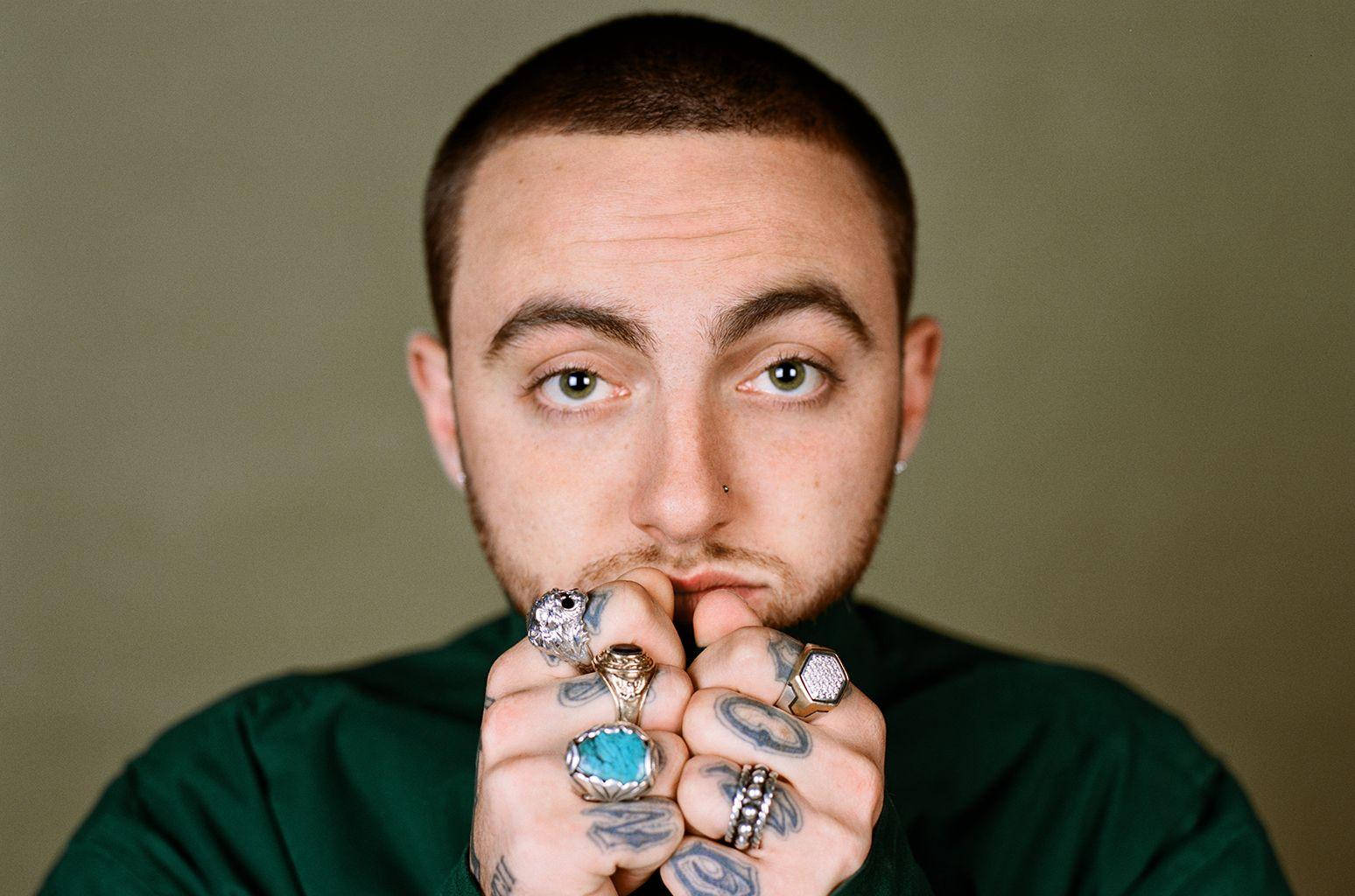 Mac Miller Pressing Hands Together Wallpaper