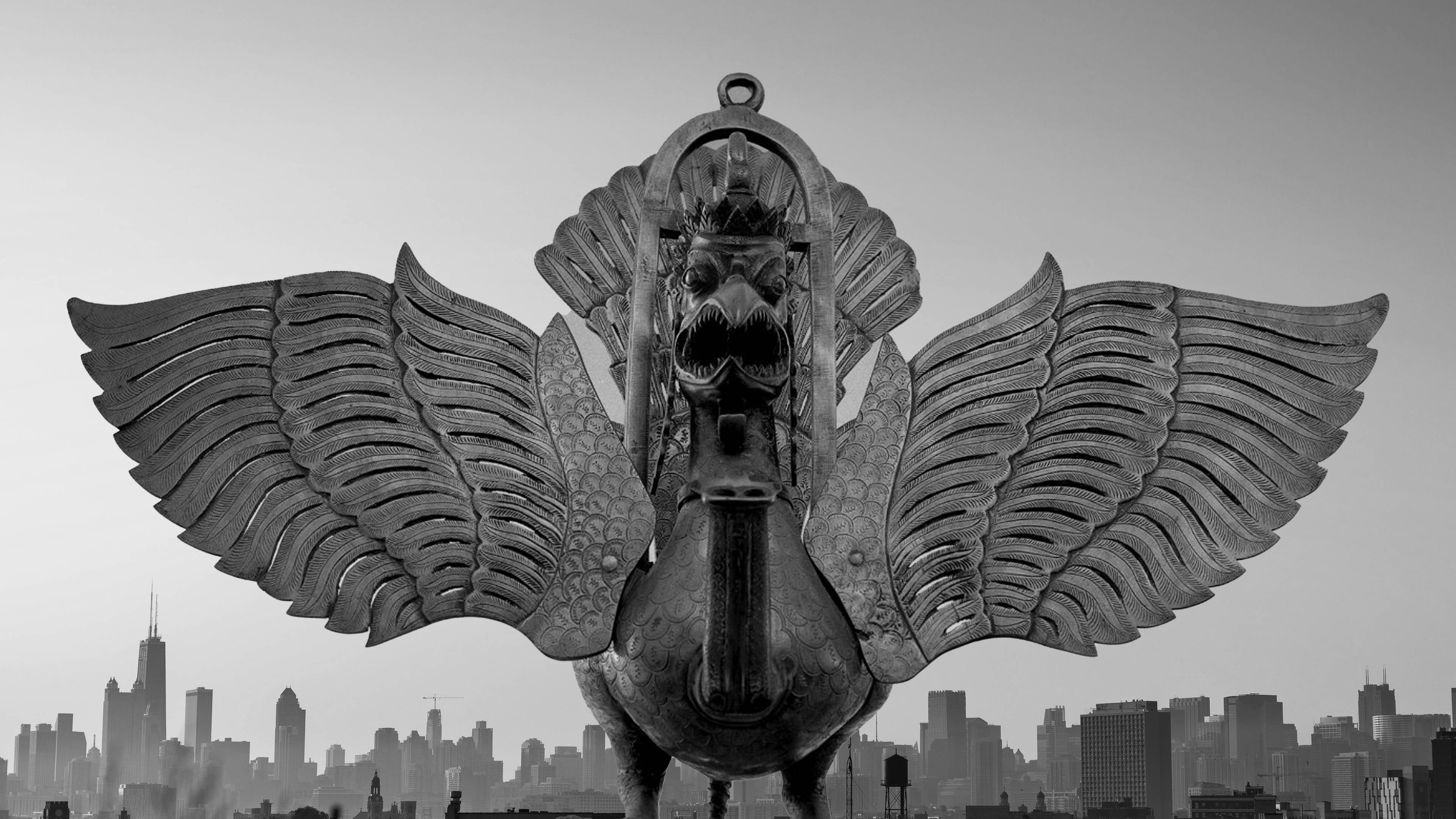 Majestic Grey Garuda Stone Sculpture Wallpaper