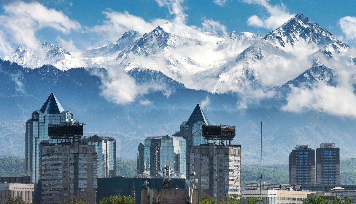 Majestic Icy Mountains Of Almaty, Kazakhstan Wallpaper