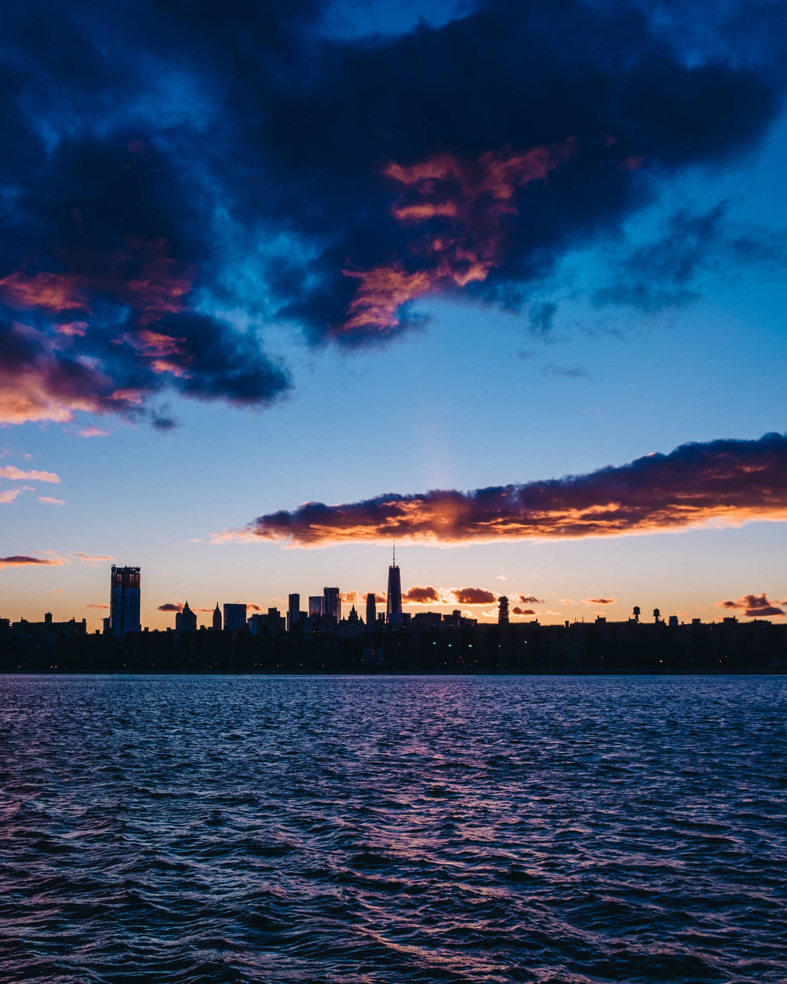 Majestic View Of New York City Skyline At Dusk Wallpaper