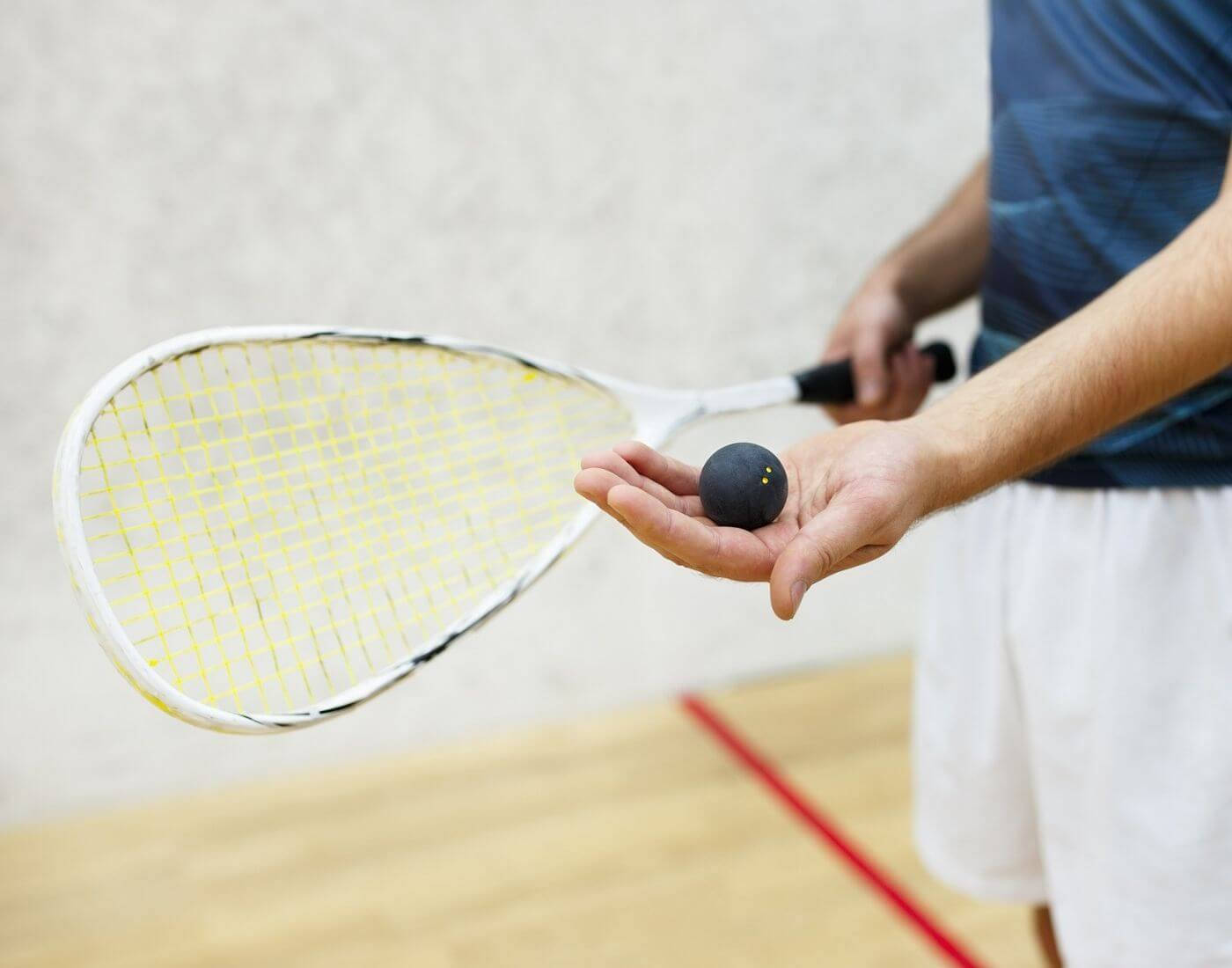 Man Getting Ready For Racquetball Match Wallpaper