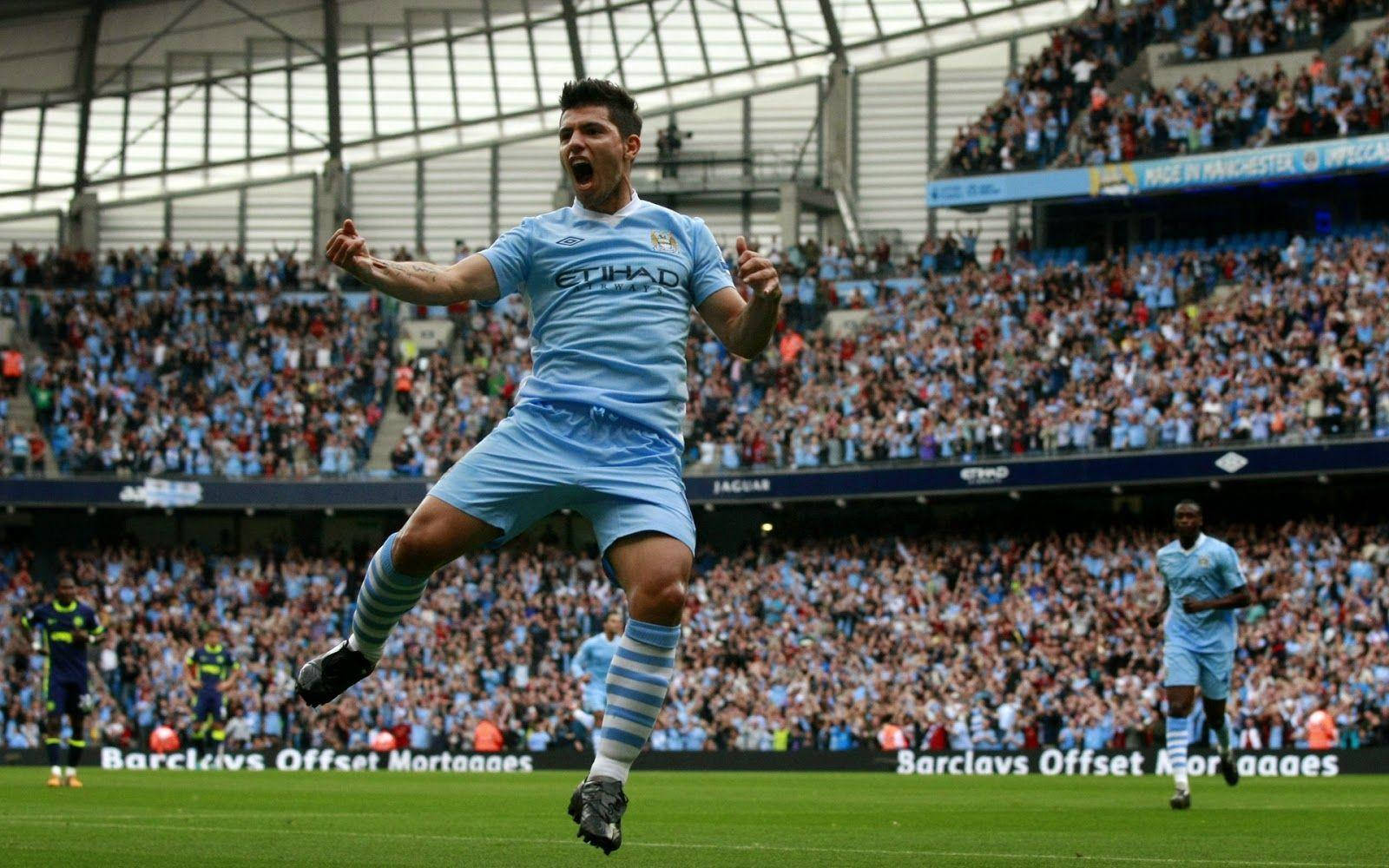 Manchester City Fc Player Cheering In Stadium Wallpaper