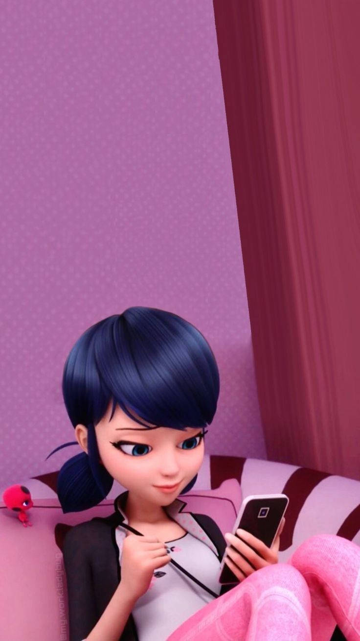 Marinette On Her Cellphone Wallpaper