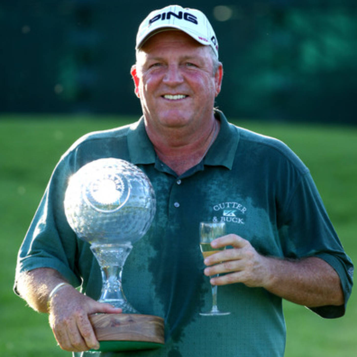 Mark Calcavecchia Trophy And Champagne Wallpaper