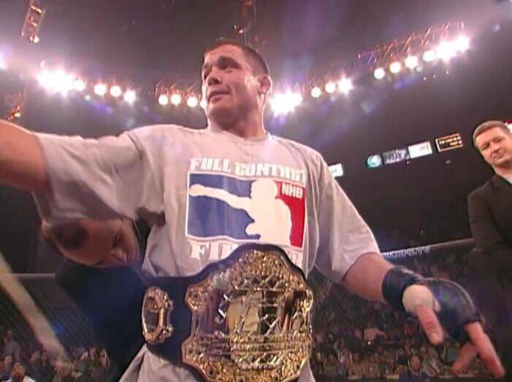 Matt Hughes On Octagon With Belt Wallpaper