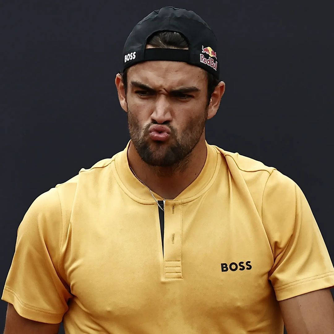 Matteo Berrettini In An Intense Moment On The Tennis Court Wallpaper