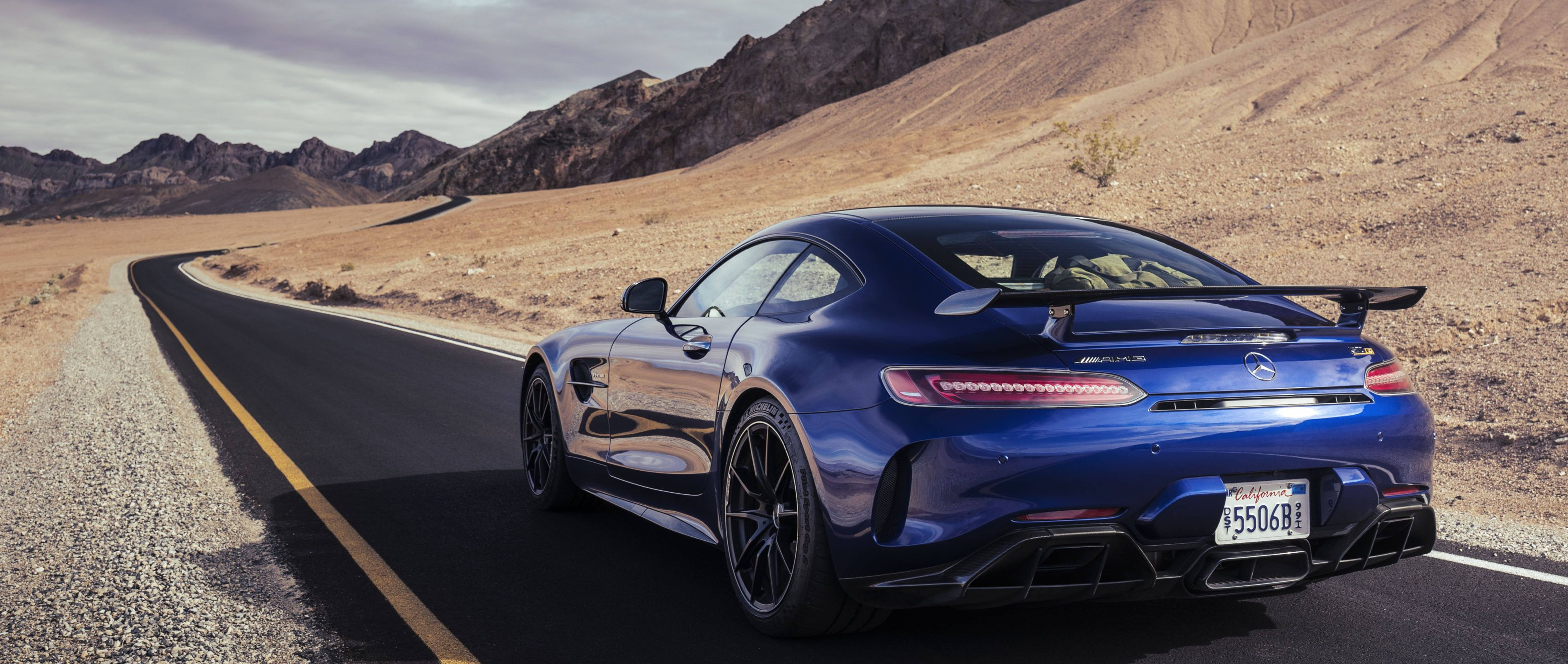 Mercedes Amg In 4k - Showcasing Superior Luxury And Power Against A Desert Backdrop Wallpaper