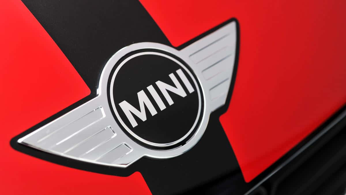 Mini Cooper Logoon Red Background Wallpaper